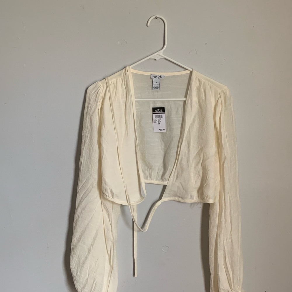 Cream white long sleeve.